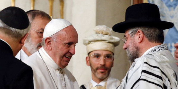 <p><i>Pope Francis is greeted as he arrives at Rome's Great Synagogue, Italy January 17, 2016. REUTERS/Alessandro Bianchi</i></p>